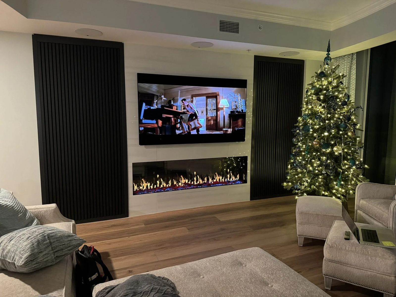 A living room with lighting, climate and audio under one control